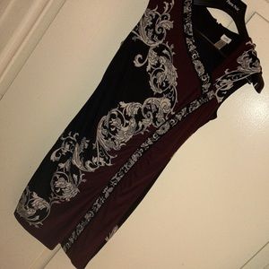 Dress.Zipper on back. Burgundy, white & black colors. 95% polyester.5% spandex.